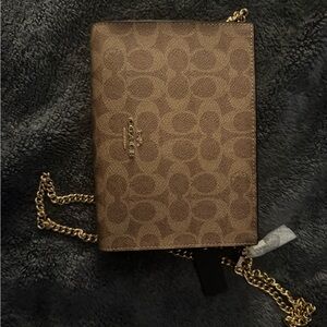 Coach Black and Tan Crossbody Bag with Gold Chain